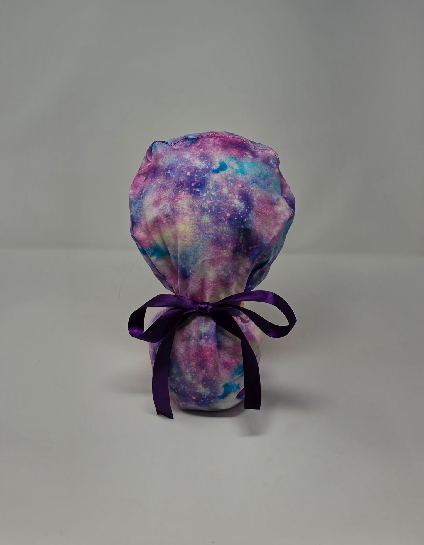 Ponytail Scrub Cap. Pink/Purple Galaxy With Purple Ribbon