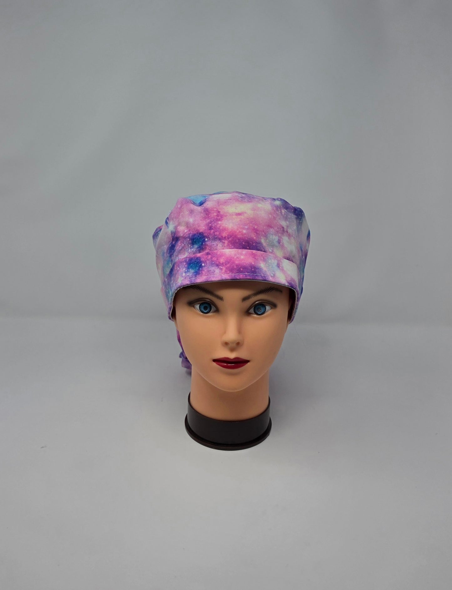 Ponytail Scrub Cap. Pink/Purple Galaxy with teal ribbon