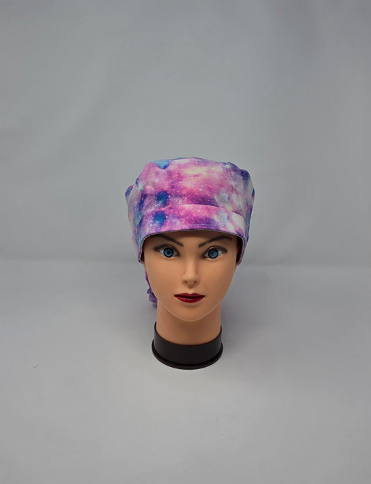 Ponytail Scrub Cap. Pink/Purple Galaxy with teal ribbon