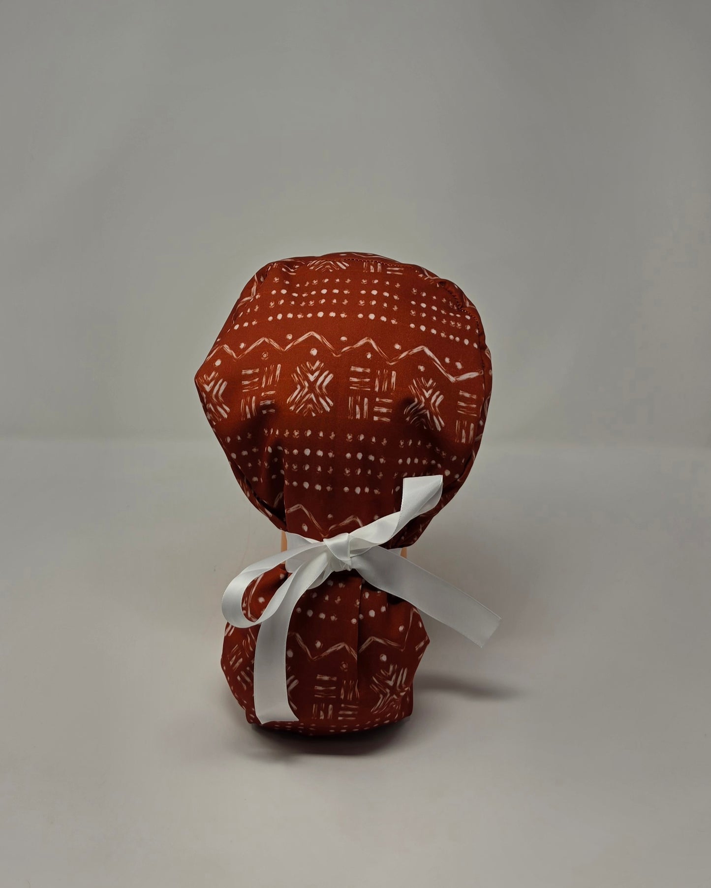 Ponytail Scrub Cap. Brown Aztec