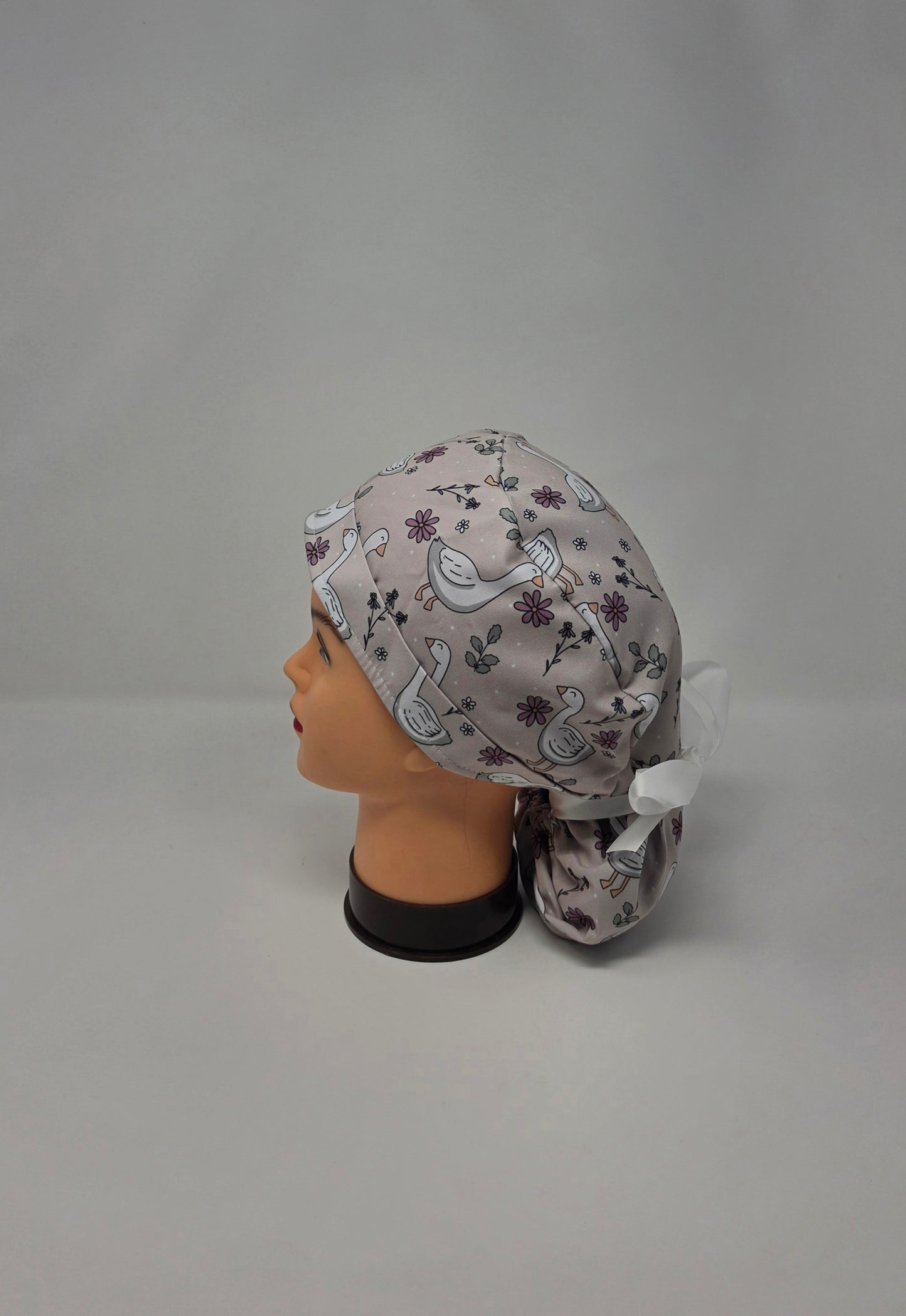 Ponytail Scrub Cap. Porch Goose with White Ribbon