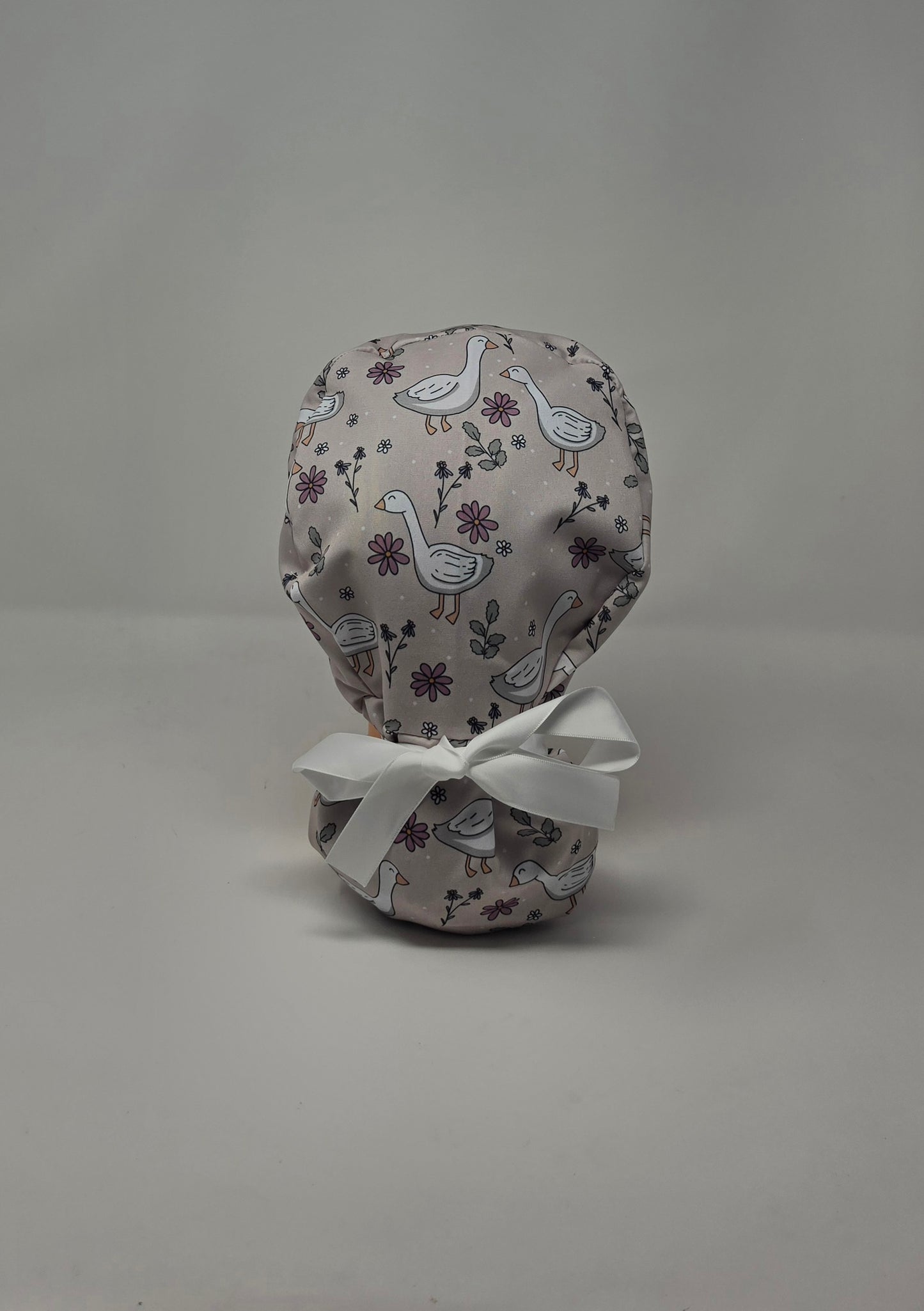 Ponytail Scrub Cap. Porch Goose with White Ribbon