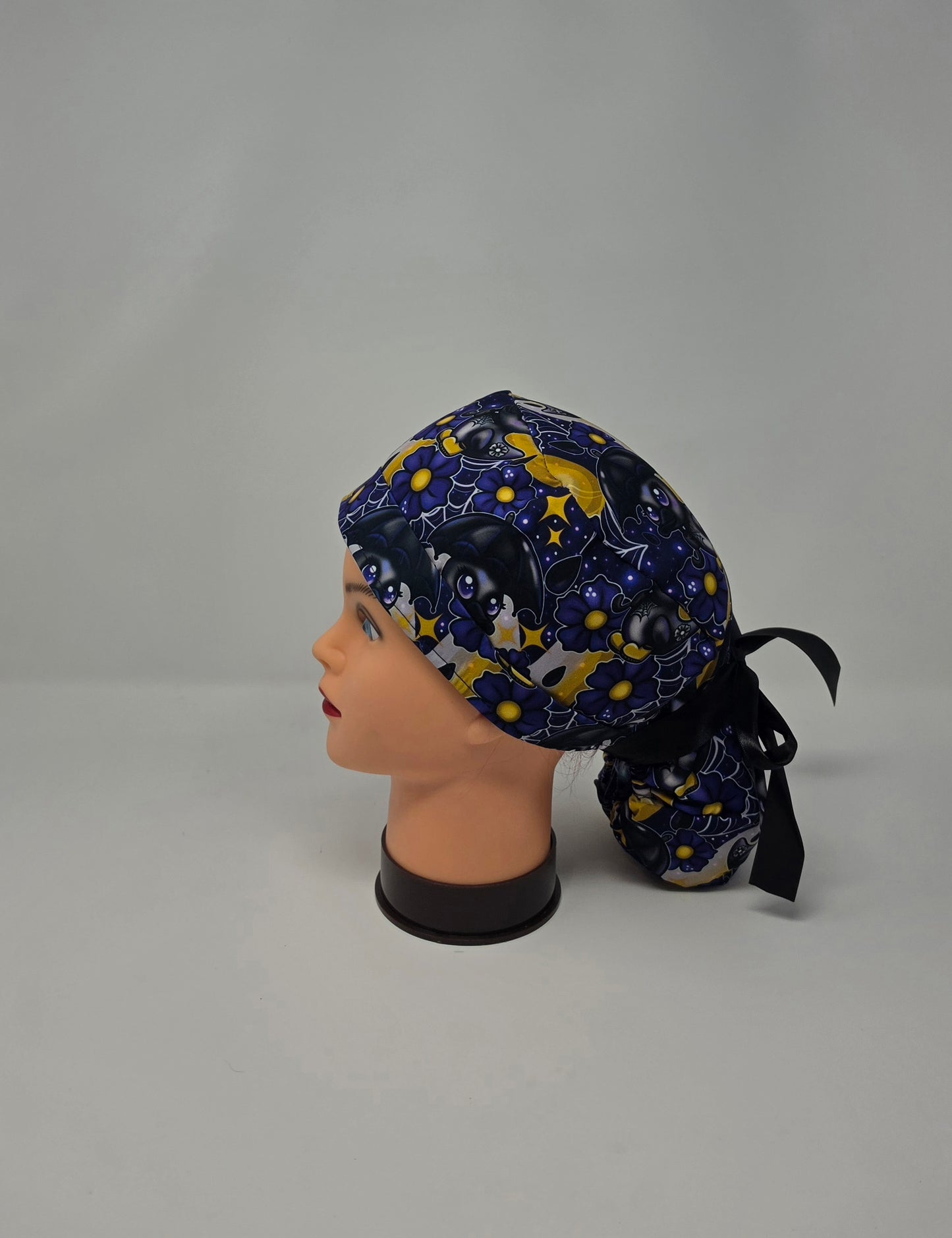 Ponytail Scrub Cap. Black Ducks