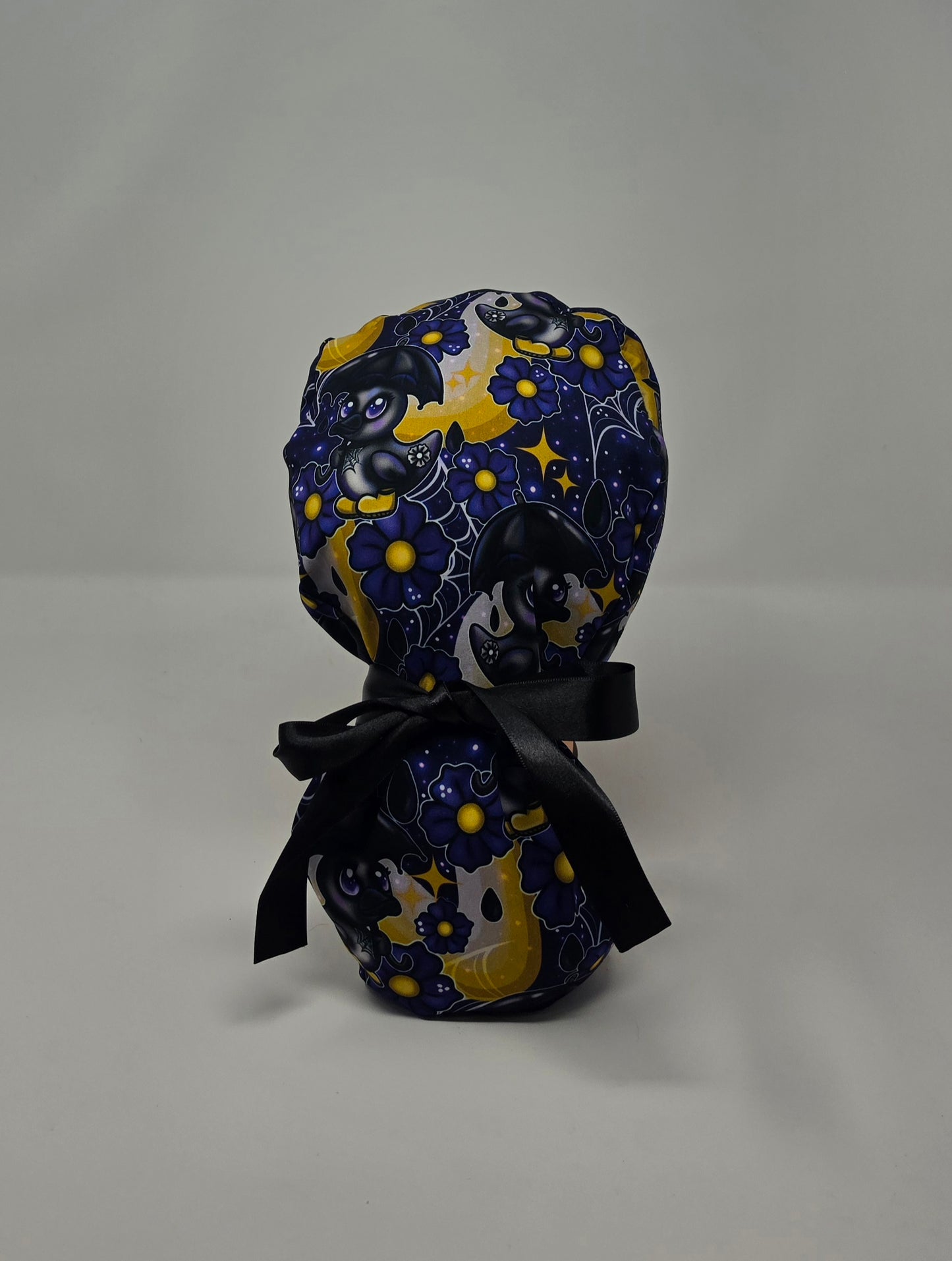 Ponytail Scrub Cap. Black Ducks
