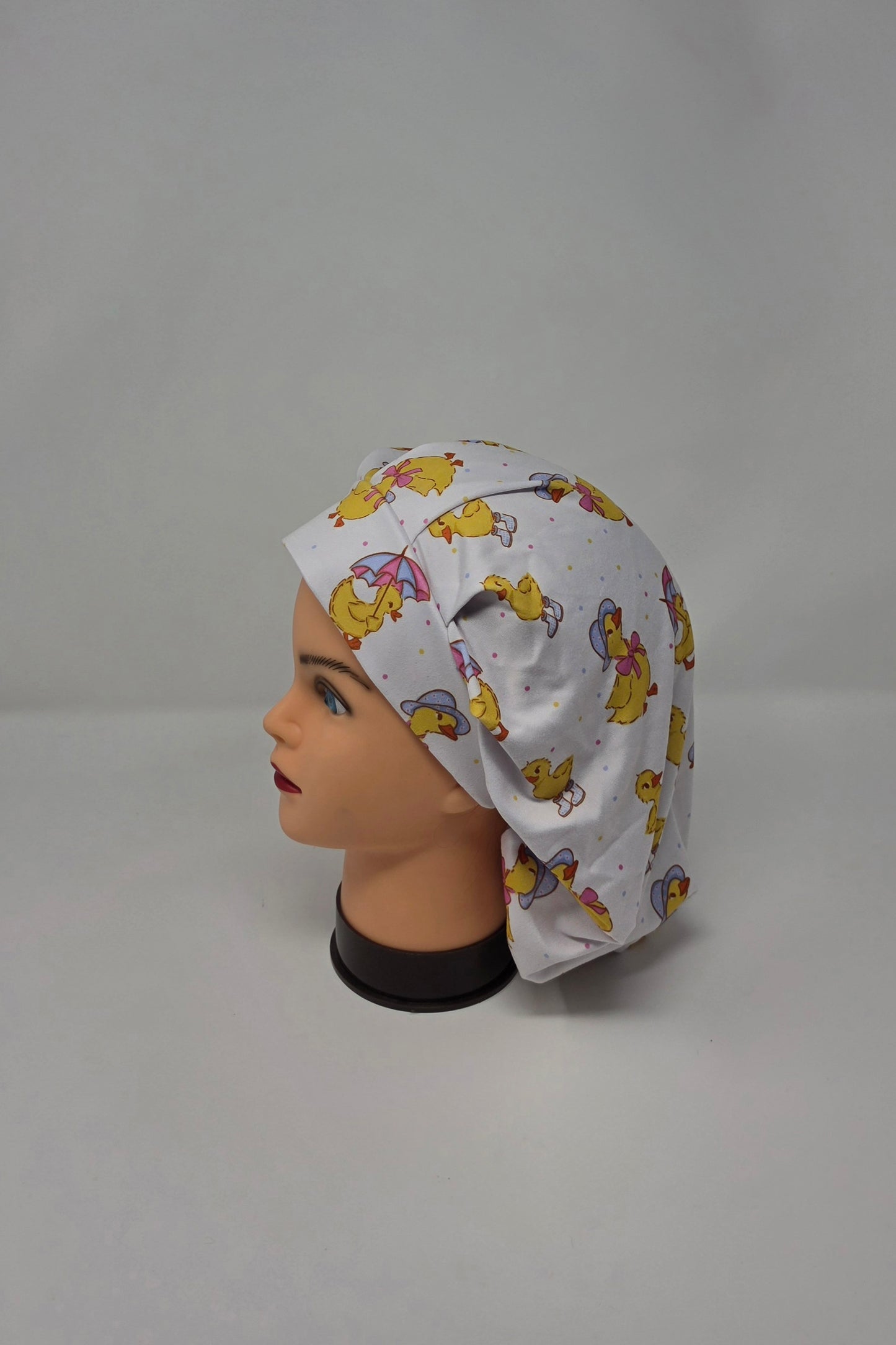 Adjustable DBP Bouffant Scrub Cap. Ducks In Rainboots
